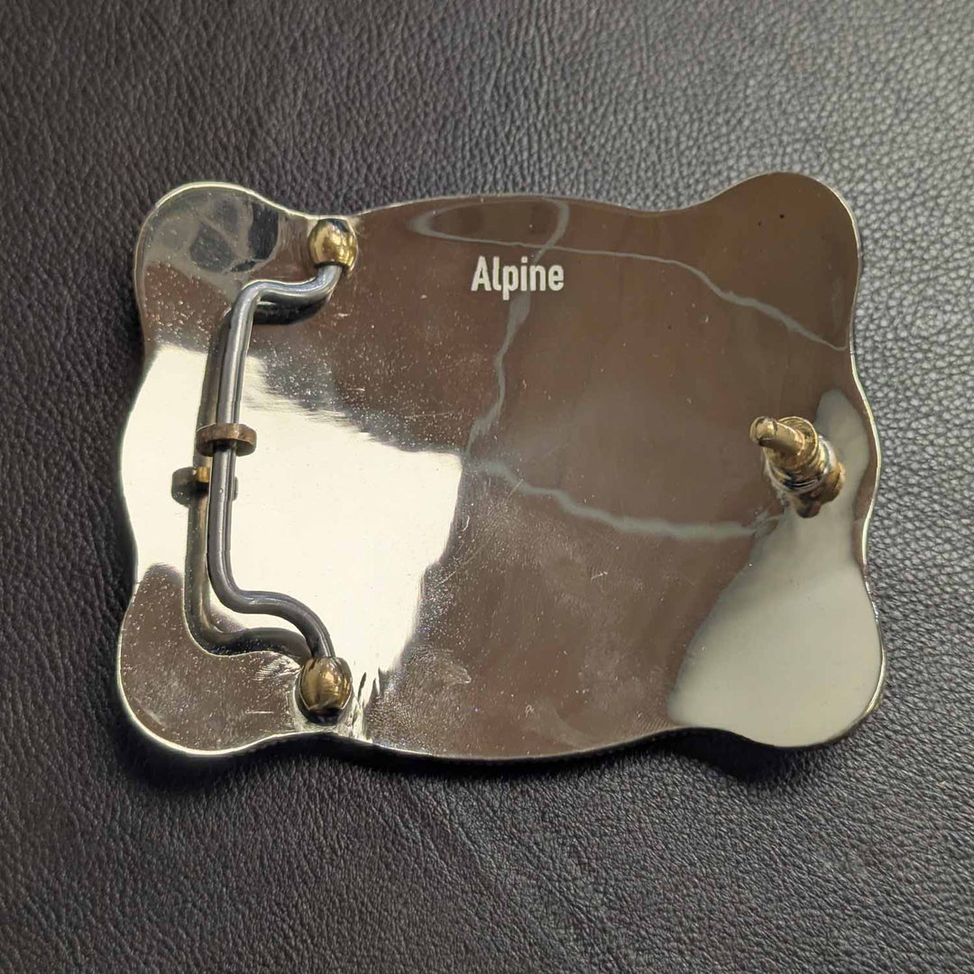 This is the back of a Tarleton State University belt buckle featuring the STU logo. Crafted in German silver and bronze.