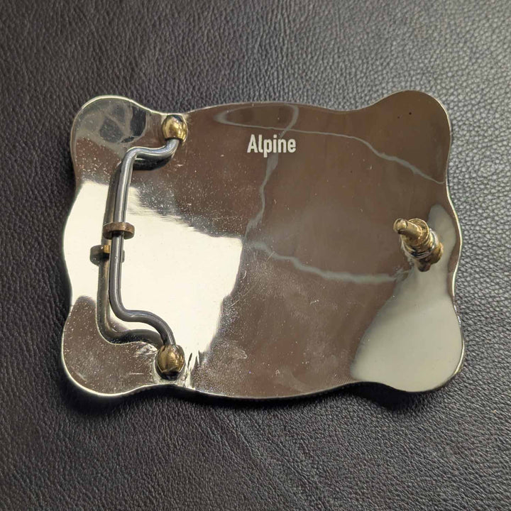 This is the back of a Tarleton State University belt buckle featuring the STU logo. Crafted in German silver and bronze.