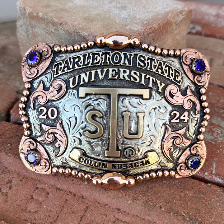 Tarleton State University Laredo Belt Buckle in German Silver. 
Tarleton State University Belt Buckle Design | Custom Western Belt Buckle | CIRCE Collections Local Custom Belt Buckle Maker | Tarleton Texan Belt Buckle