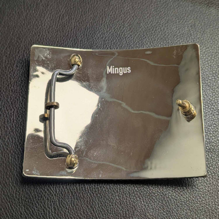 This is the back of a Tarleton State University belt buckle featuring the Power T logo. Crafted in German silver with bronze and copper accents, and clear CZs.