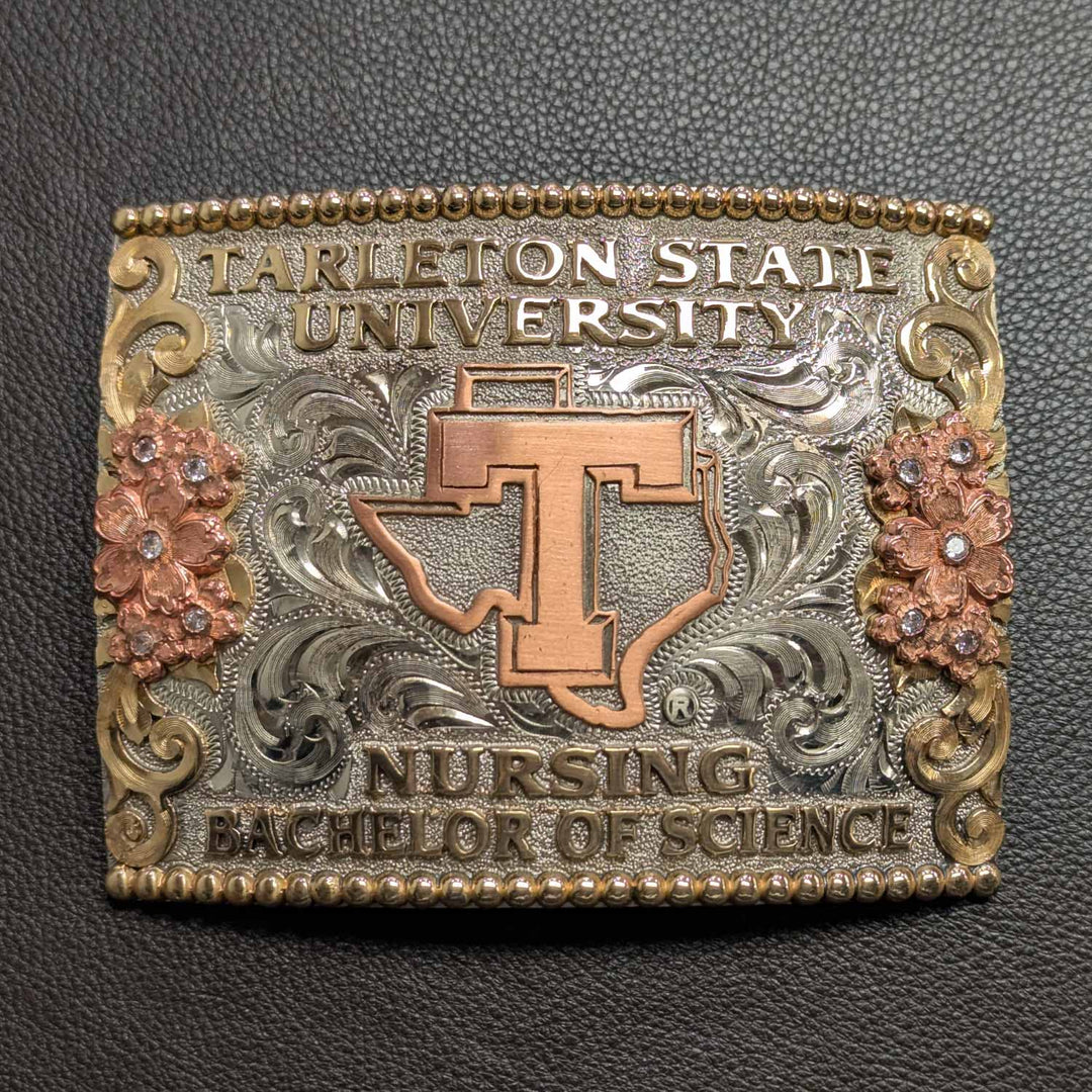 This is a Tarleton State University belt buckle featuring the Power T logo. Crafted in German silver with bronze and copper accents, and clear CZs.