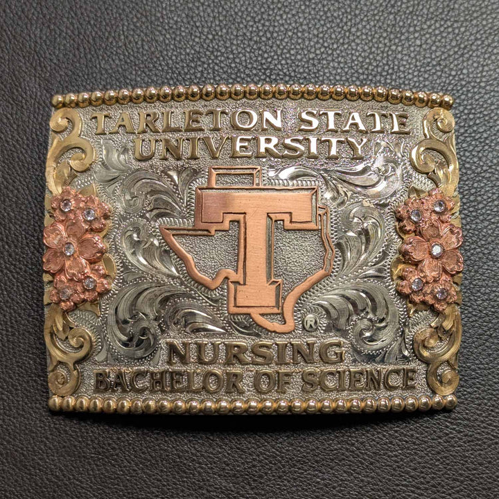 This is a Tarleton State University belt buckle featuring the Power T logo. Crafted in German silver with bronze and copper accents, and clear CZs.