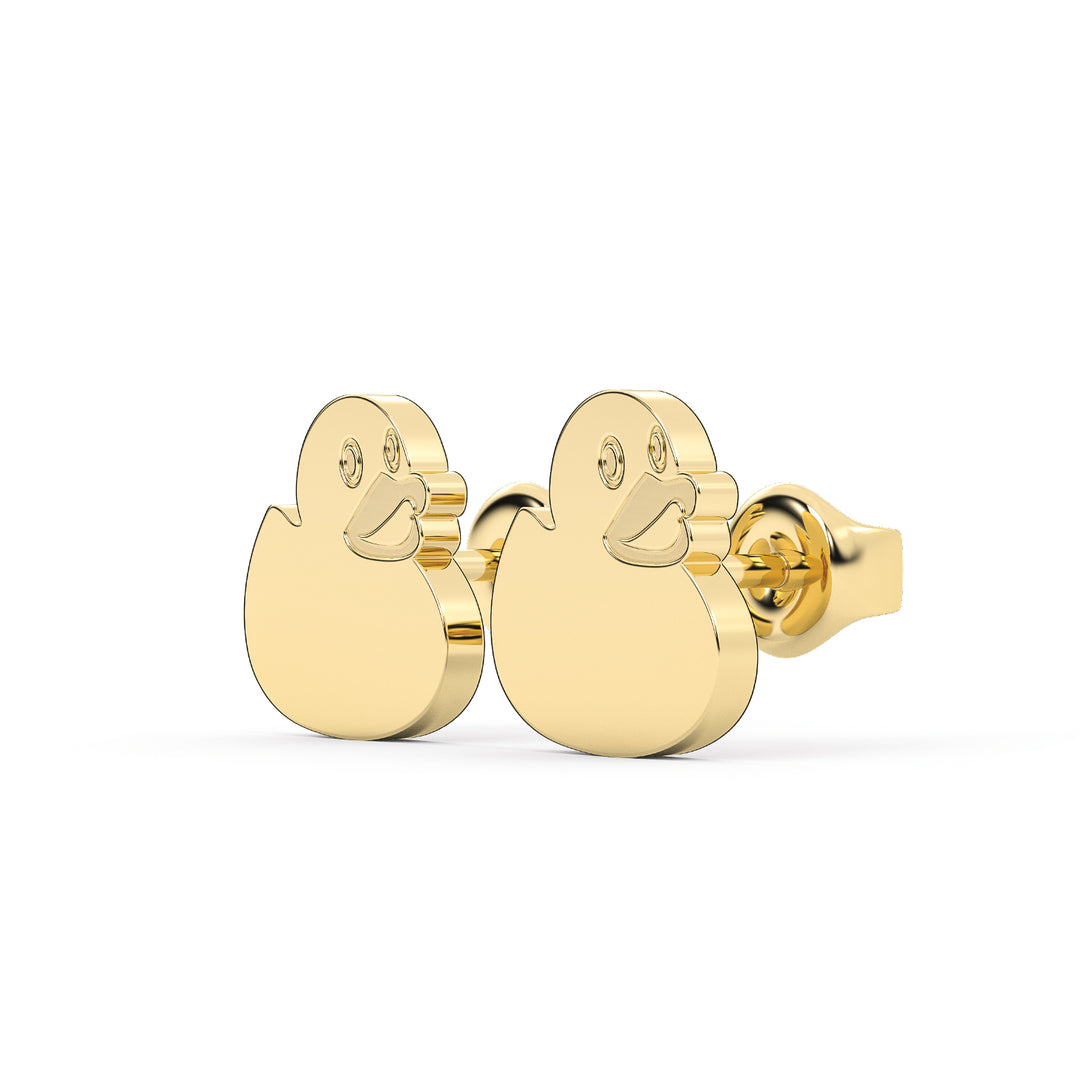 This is the secondary view looking at a 45 degree angle at a pair of duck shaped stud earrings in yellow stainless.