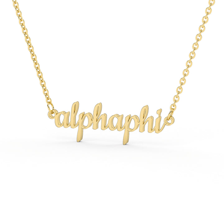 This is a gold colored stainless steel necklace of script writing that spells "Alpha Phi".