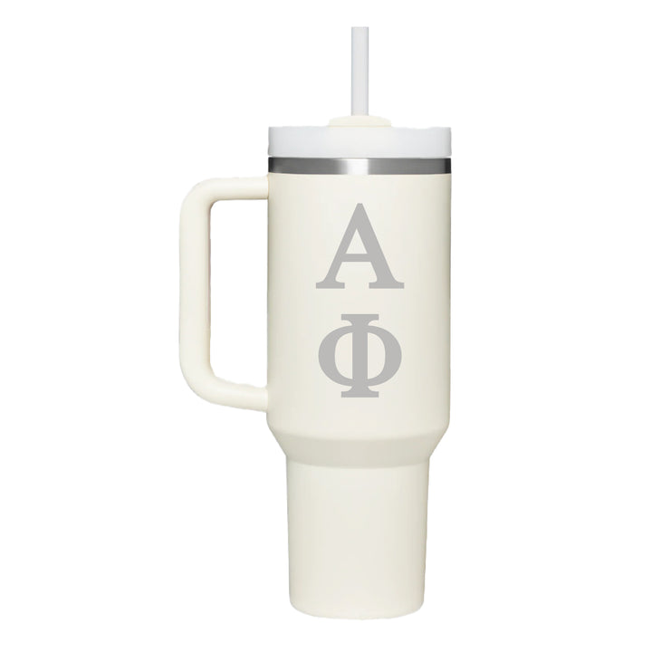 This is a stainless steel tumbler with handle and straw in cream with the greek letters for Alpha Phi engraved on the front. 