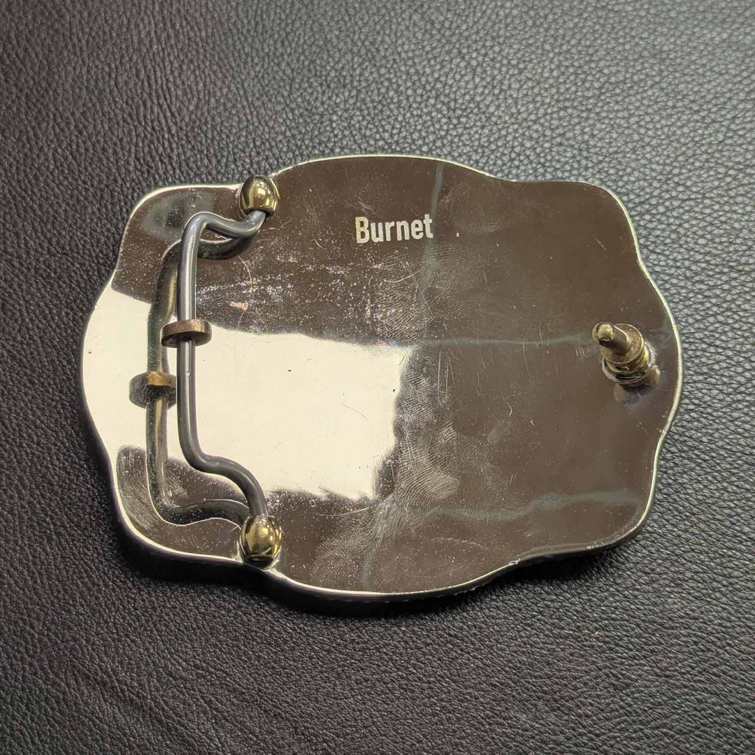 This is the back of a Tarleton State University belt buckle featuring the Power T logo. Crafted in German silver with purple and black enamel. 