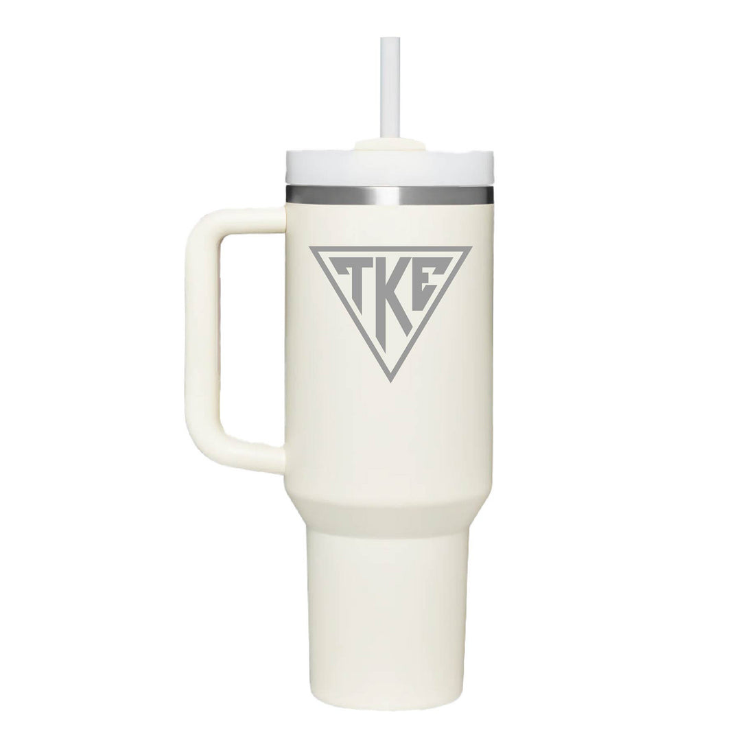 Stainless steel insulated tumbler with TKE houseplate engraved on cream tumbler. 