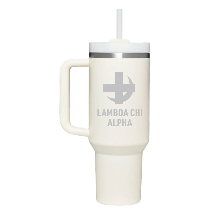 Stainless steel tumbler with the Lambda Chi Alpha logo engraved on a cream tumbler. 