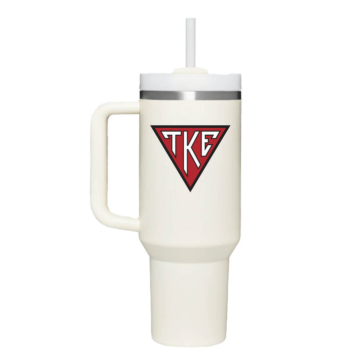 Stainless steel insulated tumbler with the Tau Kappa Epsilon color Houseplate on the front. Cream Tumbler. 