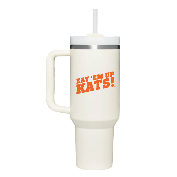 This is a stainless steel insulated cup with a handle and a lid. It features the Sam Houston State University Eat 'Em Up Kats logo. This cup is cream. 