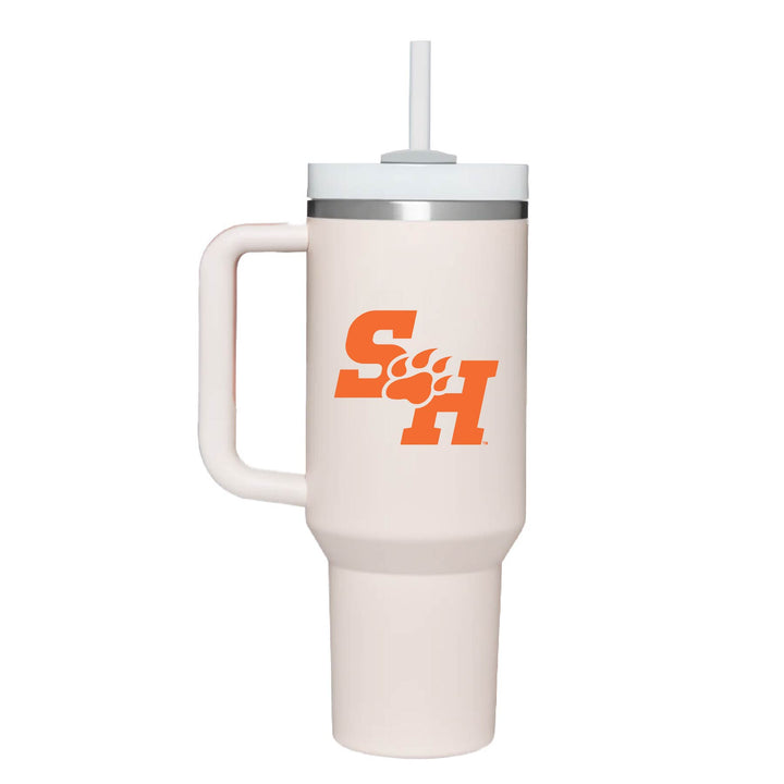 This is a stainless steel insulated cup with a handle and a lid. It features the Sam Houston State University SH Paw logo. This cup is rose quartz.