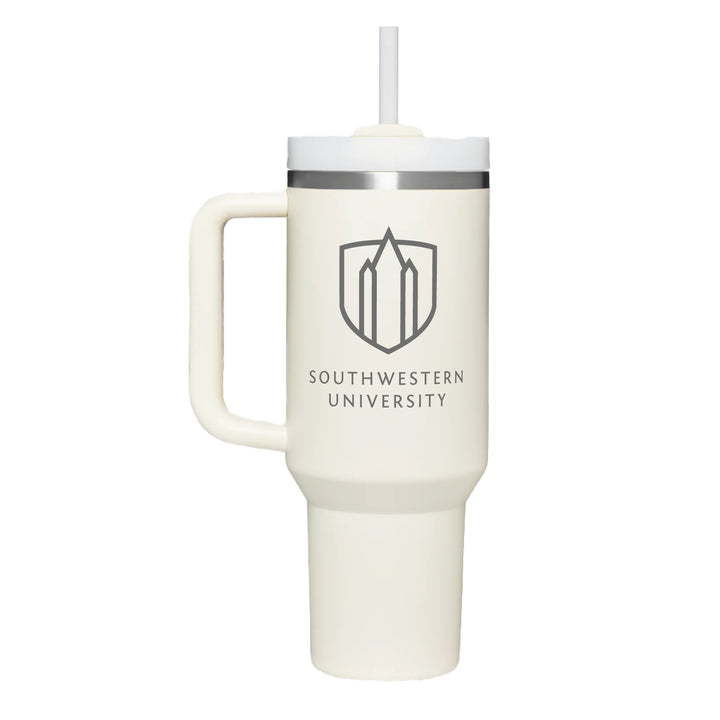 Stainless steel powder coated tumbler with handle in a cream color with the Southwestern University logo engraved on the front. 