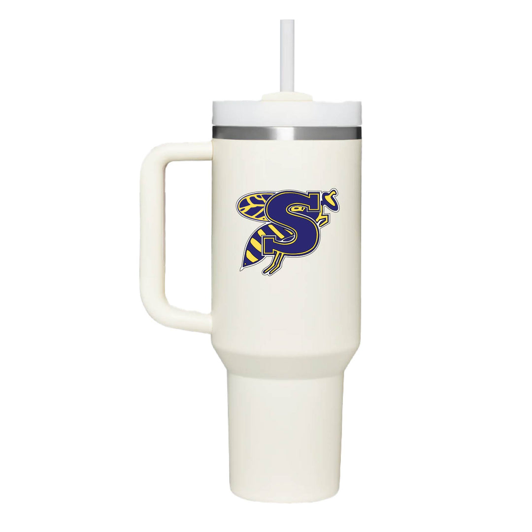 This is an insulated engraved stainless steel tumbler with a handle. The color image is the Stephenville Yellow Jackets logo. The cup is cream in color.
