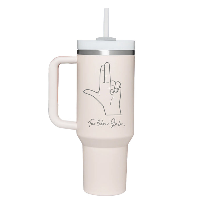 Stainless rose quartz colored handle tumbler with the Tarleton Handsign in script engraved on the front.