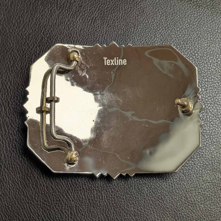 This is the back of a Tarleton State University belt buckle featuring the Power T logo with turquoise and black enameling. Crafted in German silver with bronze and copper accents, and turquoise stones.